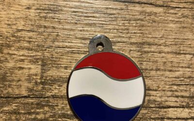 Ronde penning groot met nederlandse vlag aan 1 zijde